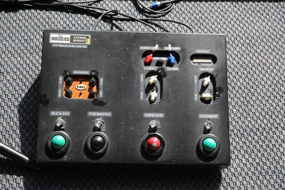 A custom audio control panel featuring knobs and buttons for echo, tempo, drive, and compression.