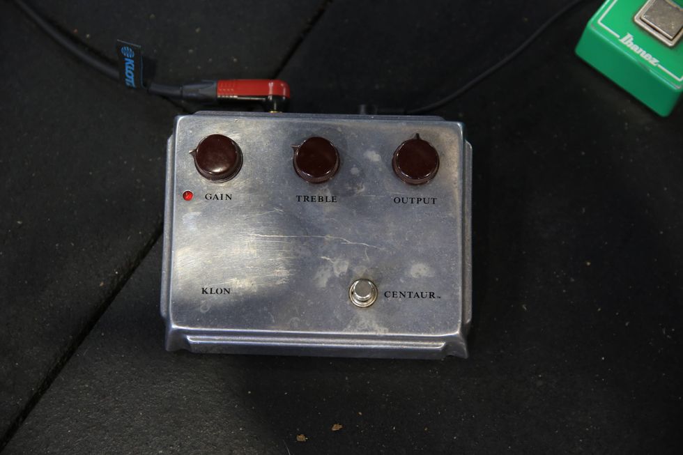 A guitar effects pedal with knobs for gain, treble, and output, labeled "Klon Centaur."