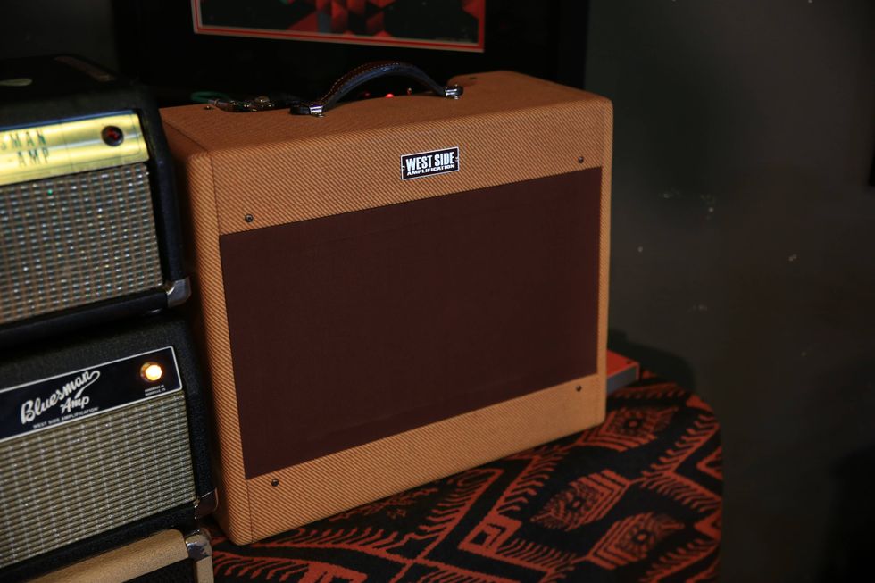 A vintage-style guitar amplifier with a textured brown cover, labeled "West Side."