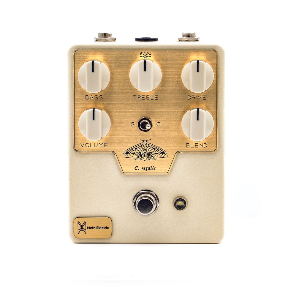 A vintage-style guitar pedal with knobs for bass, treble, drive, volume, and blend.