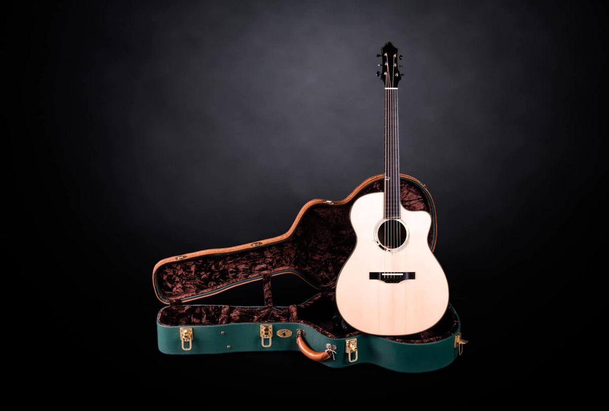 Acoustic and green guitar case