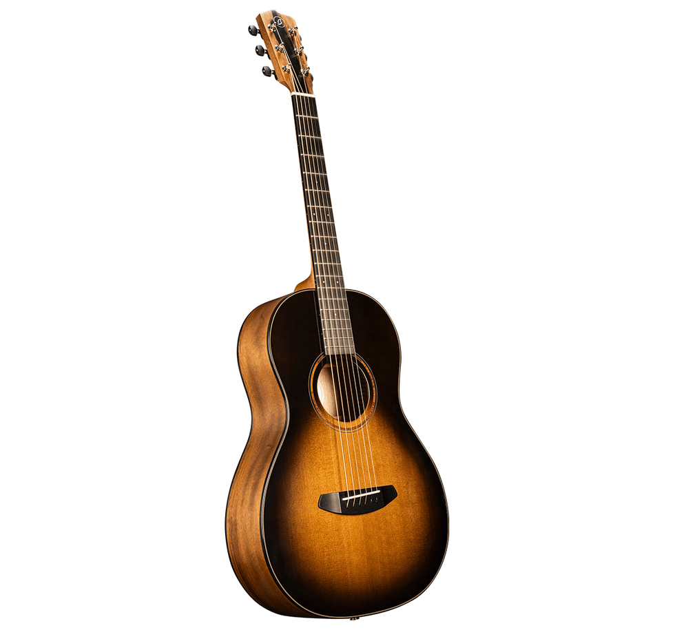 Acoustic guitar with a sunburst finish, featuring a rounded body and detailed neck.