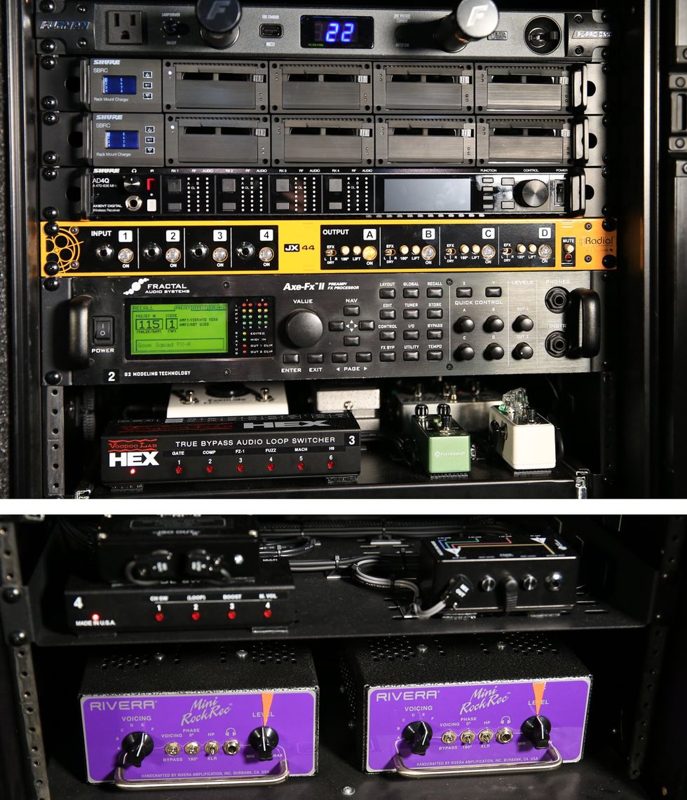 Audio rack with various effects processors, switchers, and amplifiers for music production.