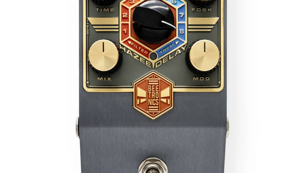 Beetronics Pollinator delay pedal with golden knobs and a colorful control panel.