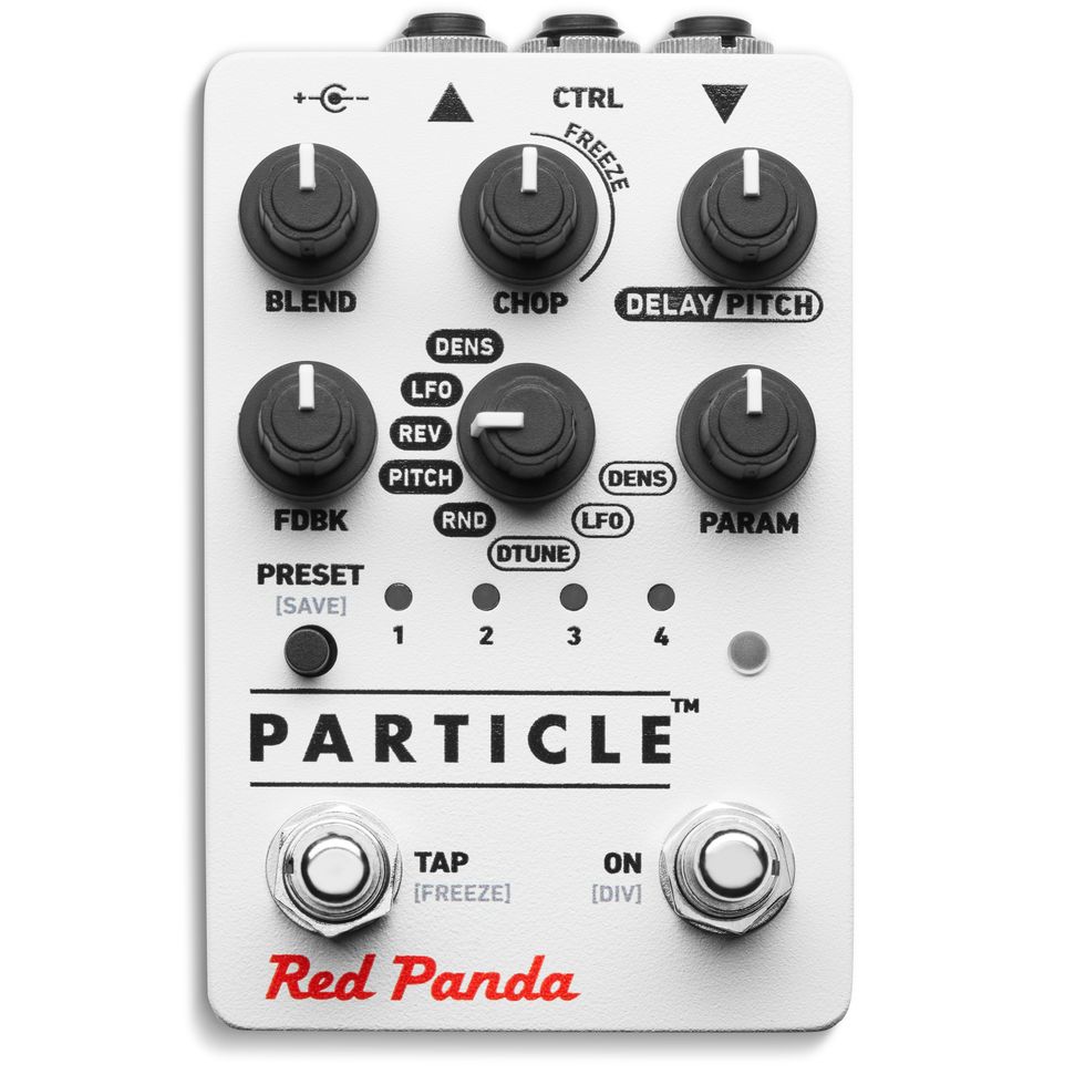 Close-up of a Red Panda Particle audio effects pedal with various control knobs and switches.
