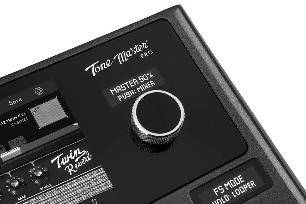 Close-up of the Tone Master Pro amplifier controls, featuring knobs and digital displays.