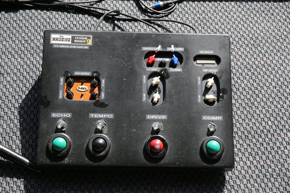 Custom audio control panel with knobs and switches for echo, tempo, drive, and compression.