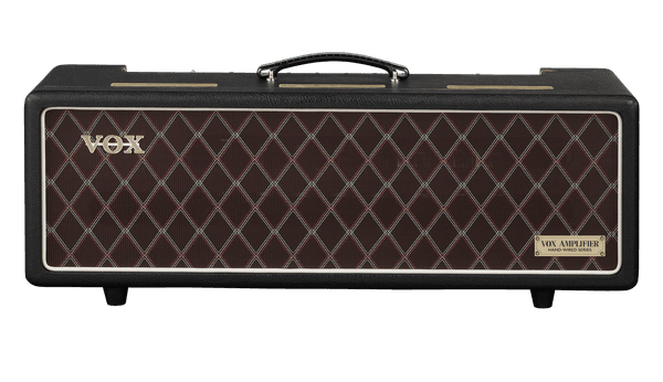Black VOX guitar amplifier with a diamond-patterned front and a top handle.