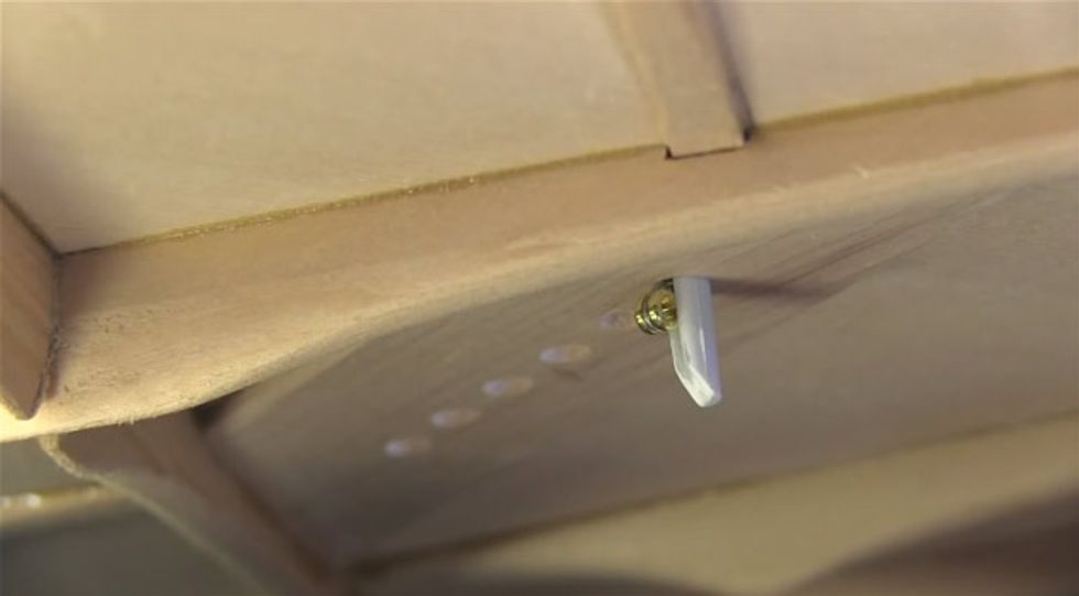 my bridge pin keep popping out. i’ve been trying to change my low e