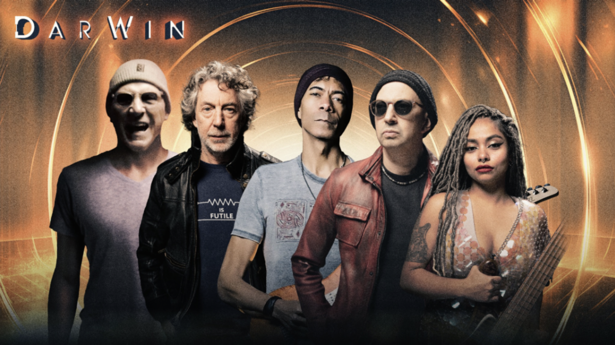 Five musicians stand together against a cosmic background, showcasing diverse styles.