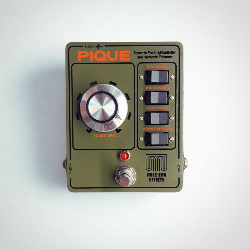 Green guitar effects pedal with controls for boost level, high/low frequency, and brilliance.