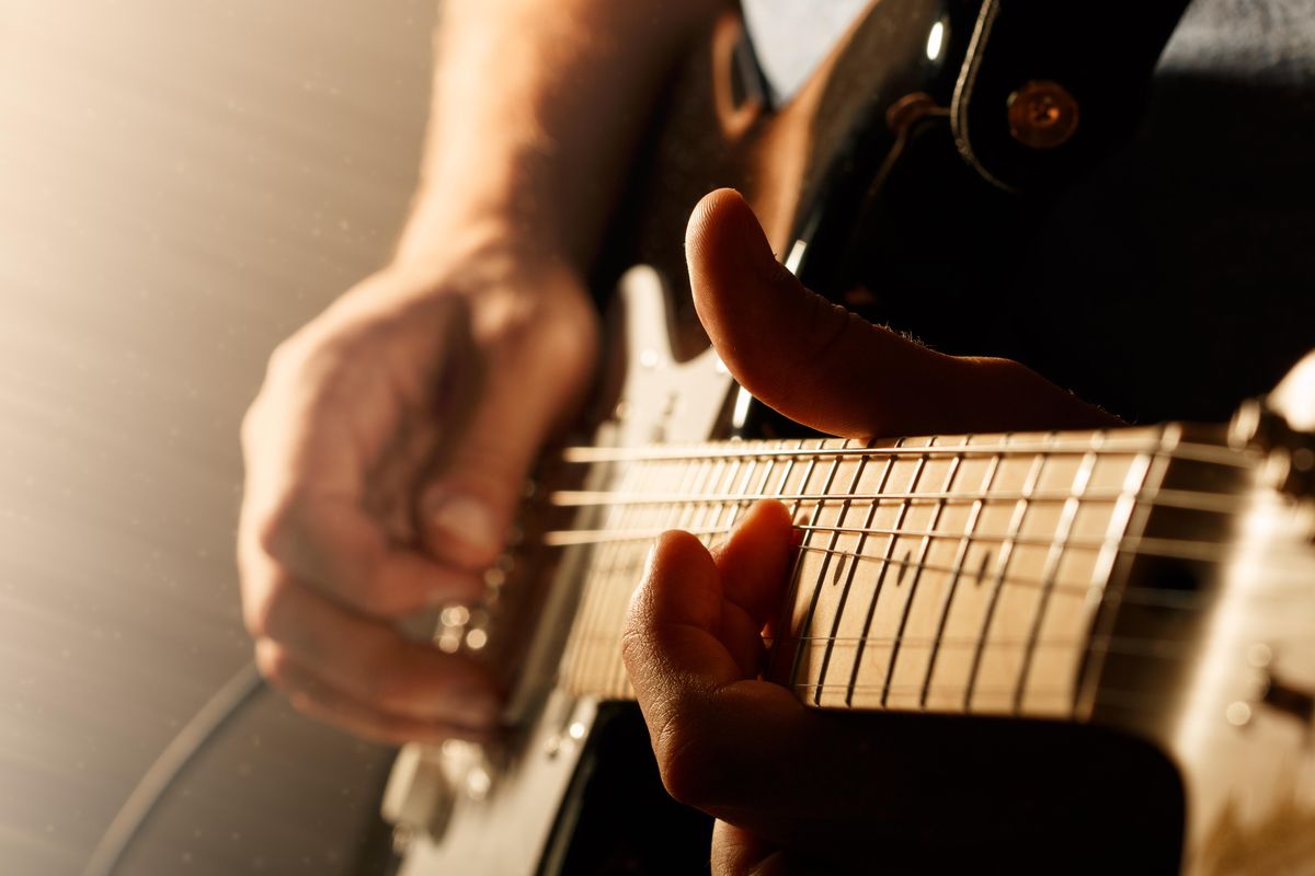 Guitar string bending