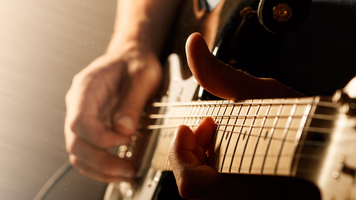 Guitar string bending