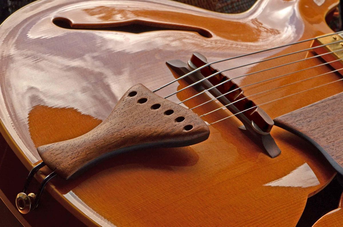Guitar string tension