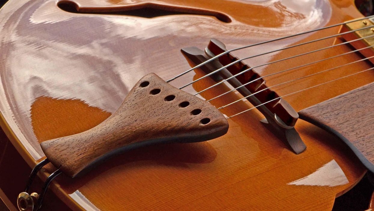 Guitar string tension