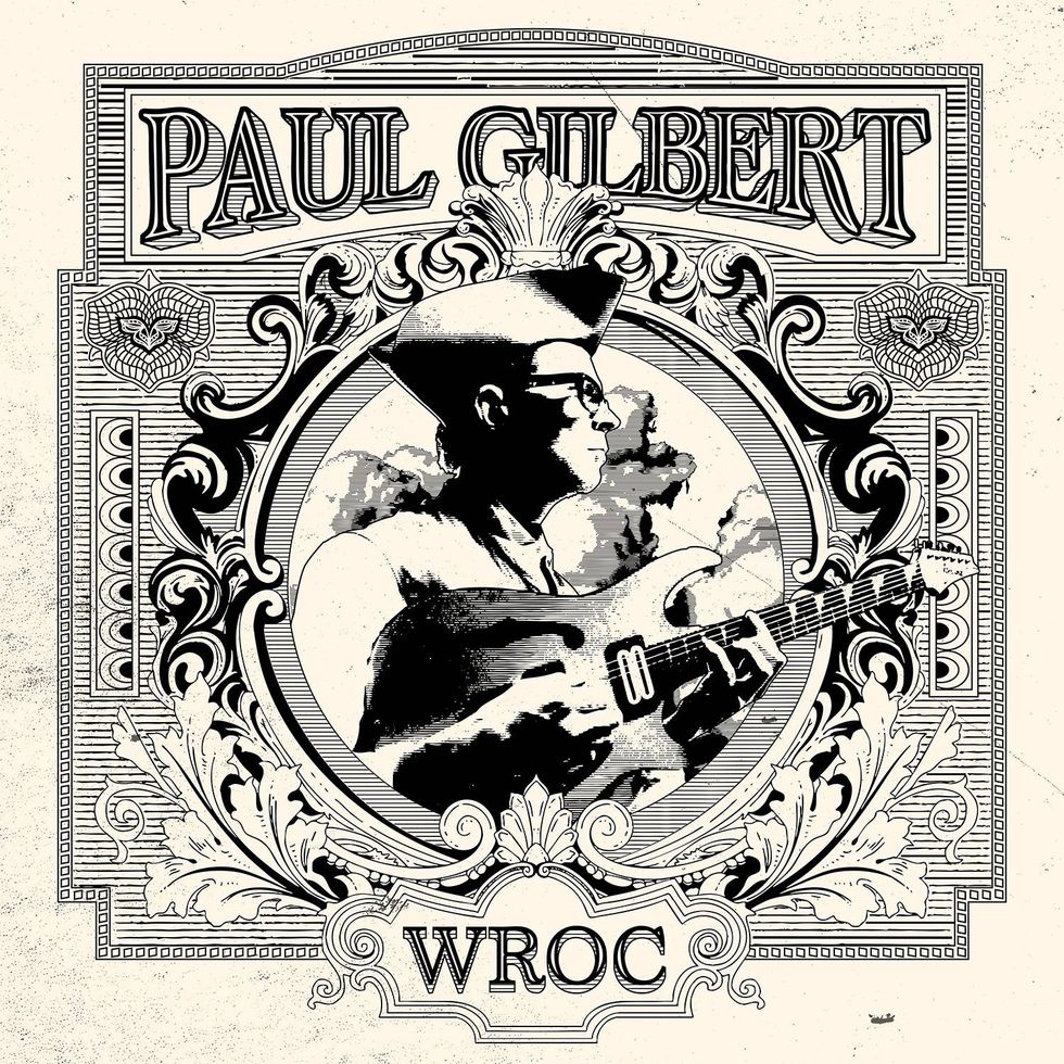 Illustration of Paul Gilbert with guitar, ornate border, and "WROC" at the bottom.