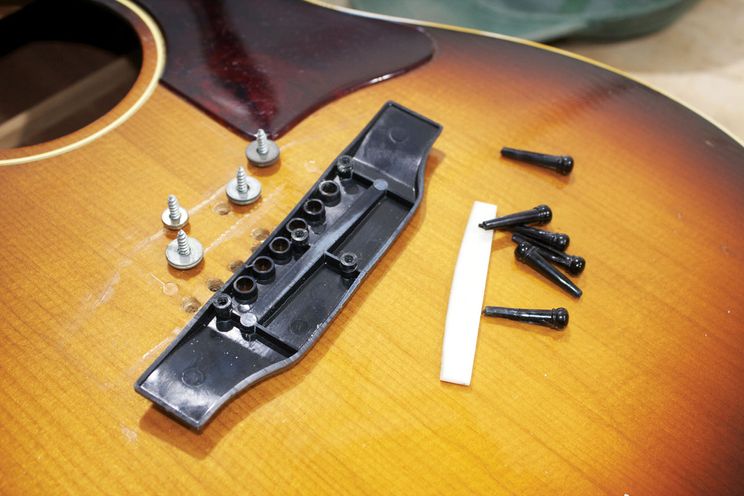 Why Plastic Bridges and Acoustic Guitars Don't Mix - Premier Guitar