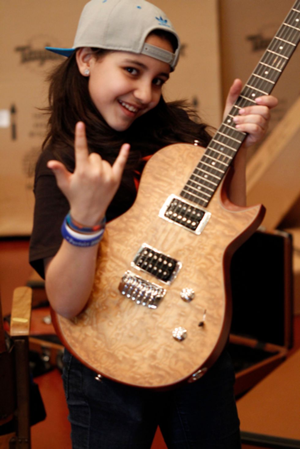Taylor Guitars Pledges 300 Guitars to Little Kids Rock