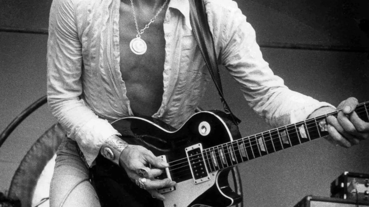 Jeff Beck playing oxblood guitar live in 1954