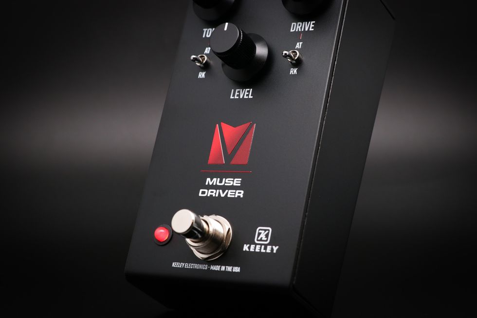 Keeley Muse Driver over black background