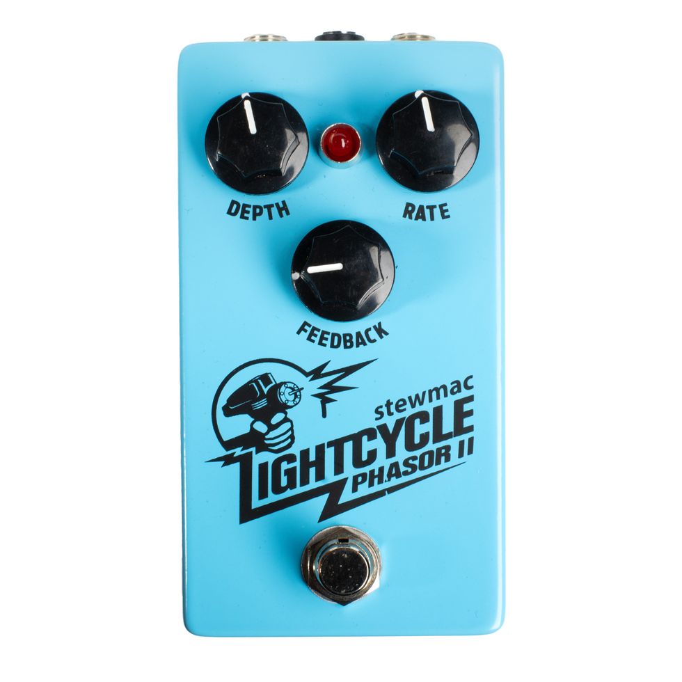 Light blue phaser pedal with three black knobs labeled Depth, Rate, and Feedback.