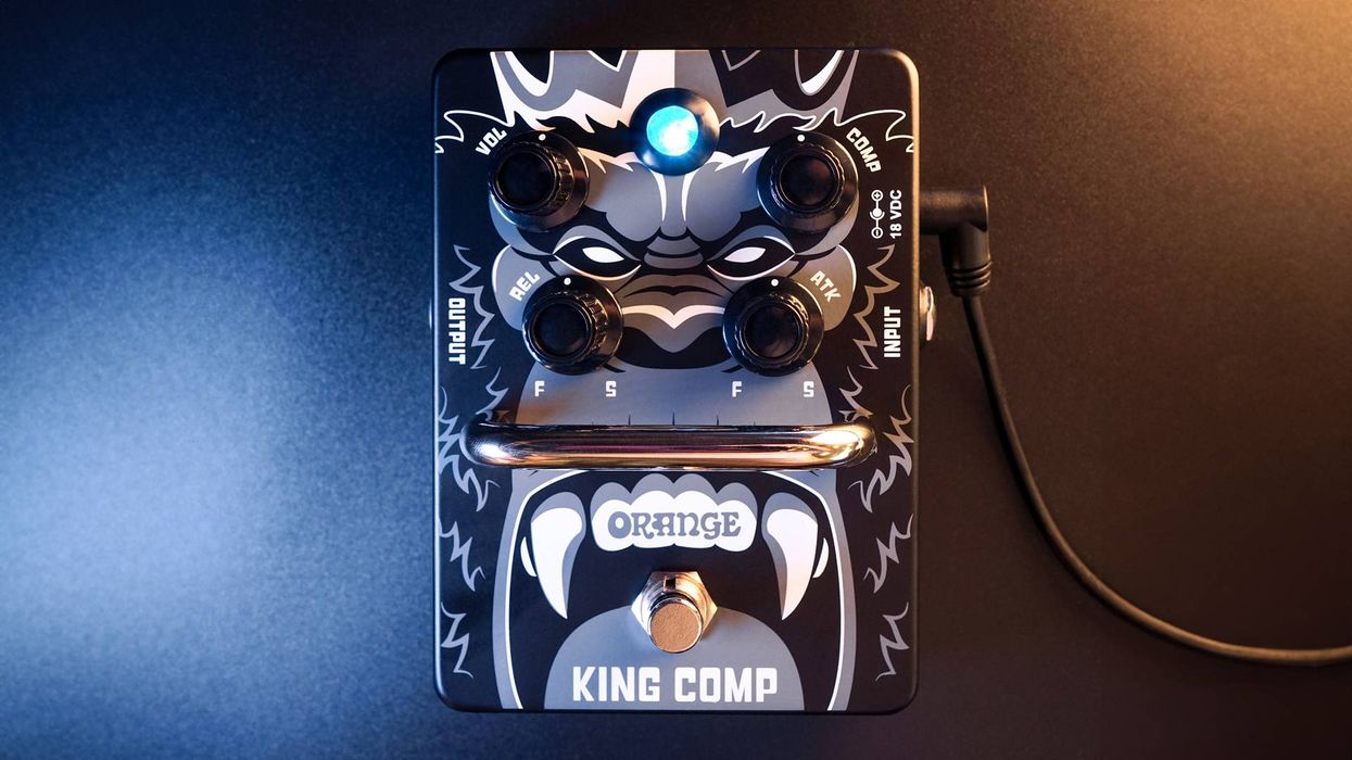 Orange King Comp guitar effects pedal with dials and a blue LED light.