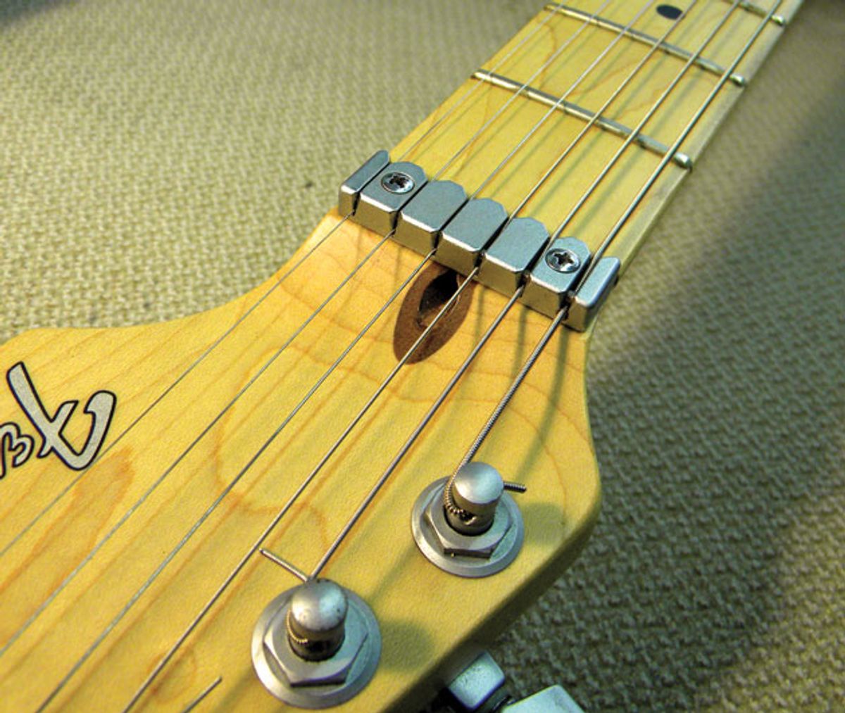 Guitar Shop 101: Dealing with a Stripped Truss-Rod Nut