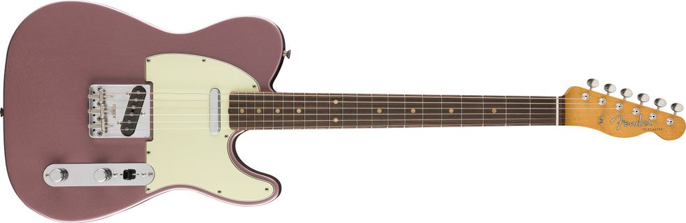 Pink electric guitar with a cream pickguard and a rosewood fretboard.