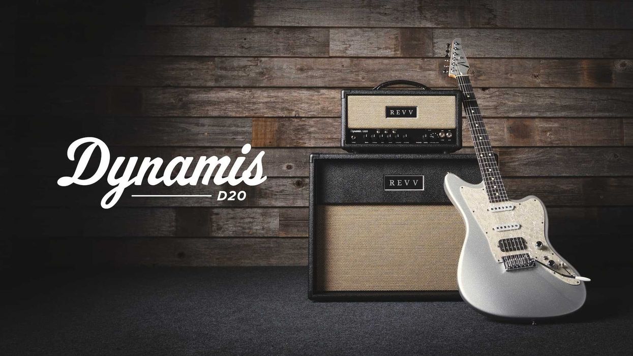 Silver electric guitar with Revv amp, set against a rustic wooden backdrop.