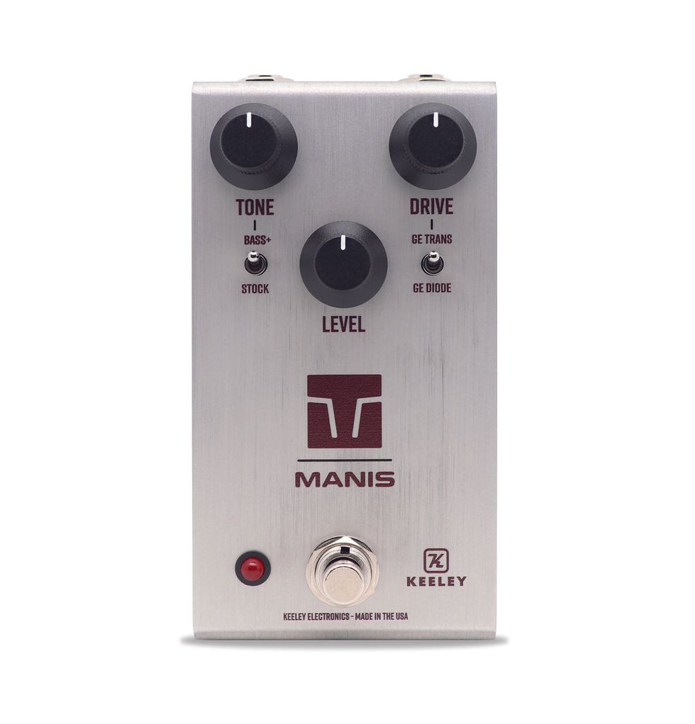 Silver guitar pedal with knobs labeled Tone, Drive, and Level, and a red LED indicator.