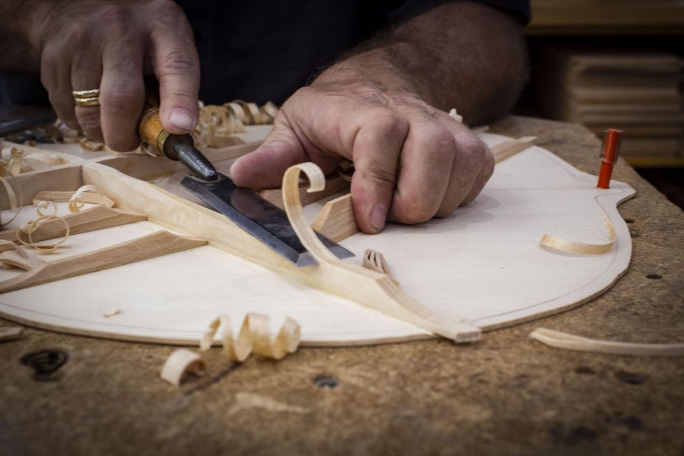 Tapered guitar brace