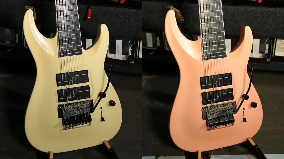 Two electric guitars side by side: one cream and one light pink. Both feature black pickups.