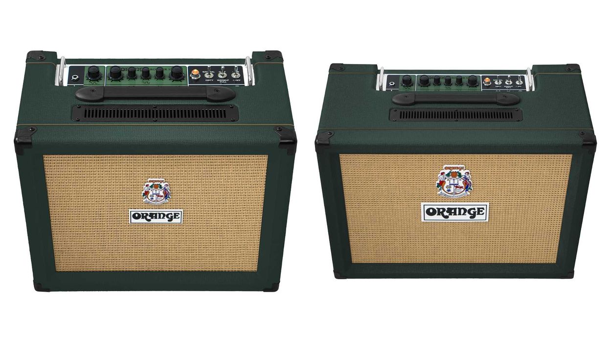 Two green guitar amplifiers with cream speaker covers, featuring knobs and controls on top.