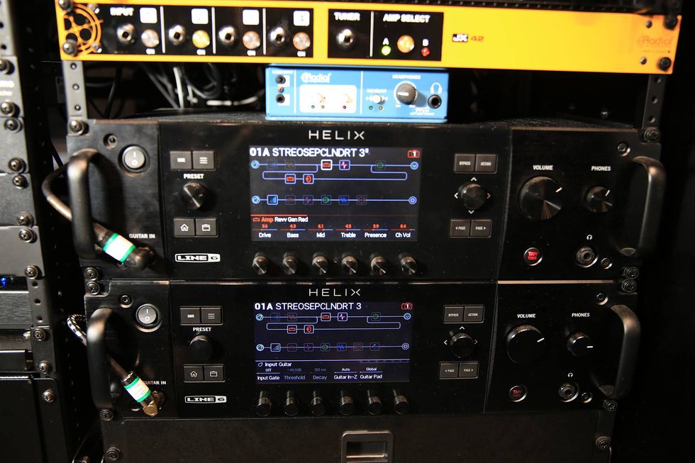 Two Line 6 Helix processors with displays, knobs, and inputs in a rack setup.
