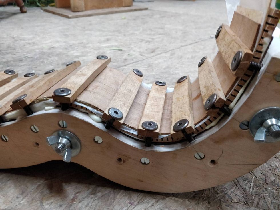 Acoustic Soundboard: Strengthen Your Guitar with Structured Sides